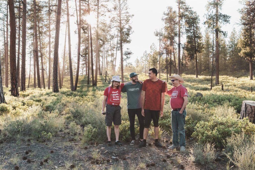 A group of intellectually disabled individuals on a hike in Oregon with an ALSO direct support professional. 