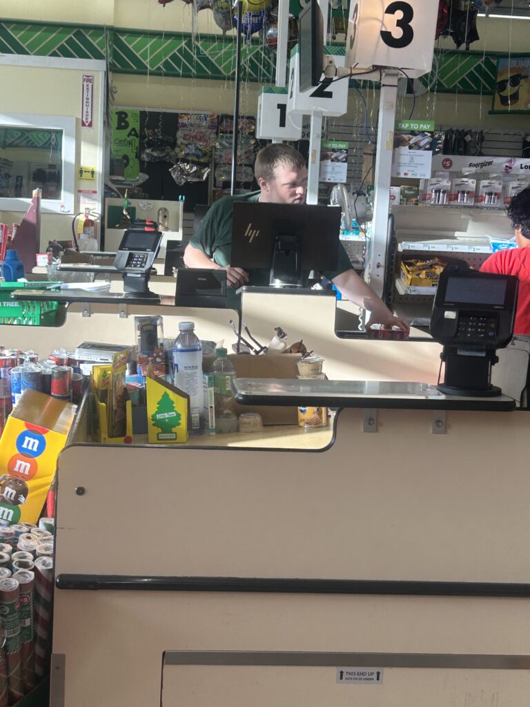 Duncan works at a local store as part of ALSO's supported employment services.